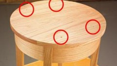 Fix a screw through a wood surface