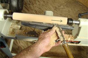 turning12 After the spindle is completely round from end to end, use a skew to level it off by working from the center out.