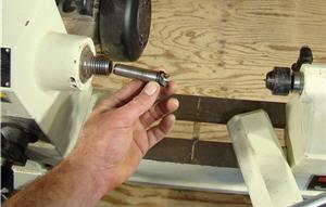 turning5 Insert the spur center into the headstock.